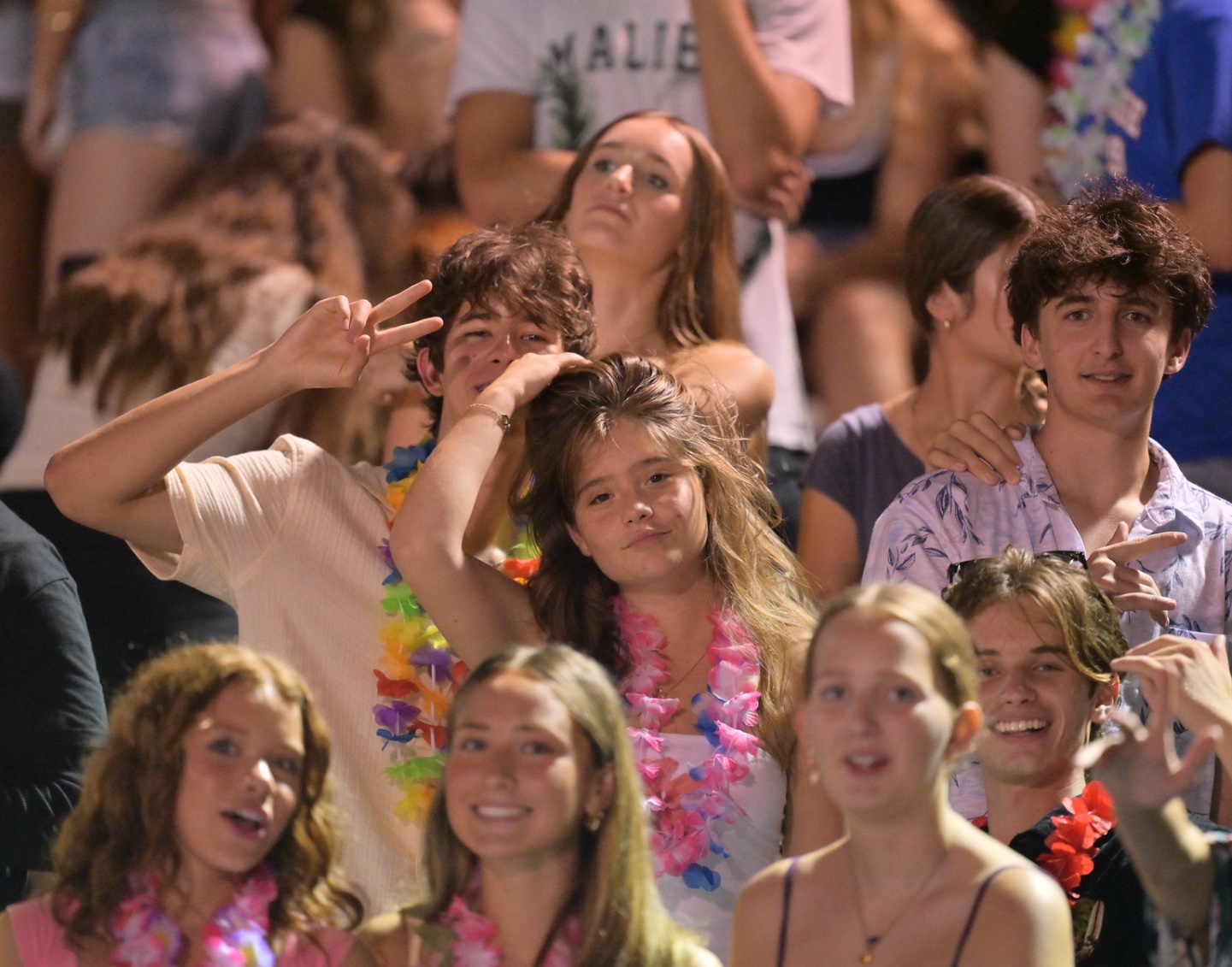 West Orange students cheering from the Friday night football crowd.